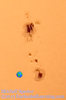 A Sunspot Cluster as Long as 11 Earths in a Row